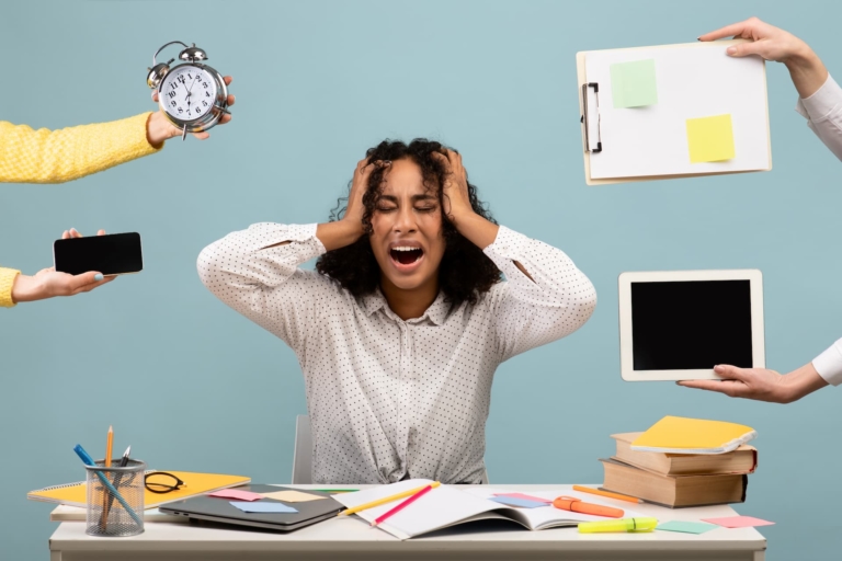 Woman stressed out due to having many tasks to complete.