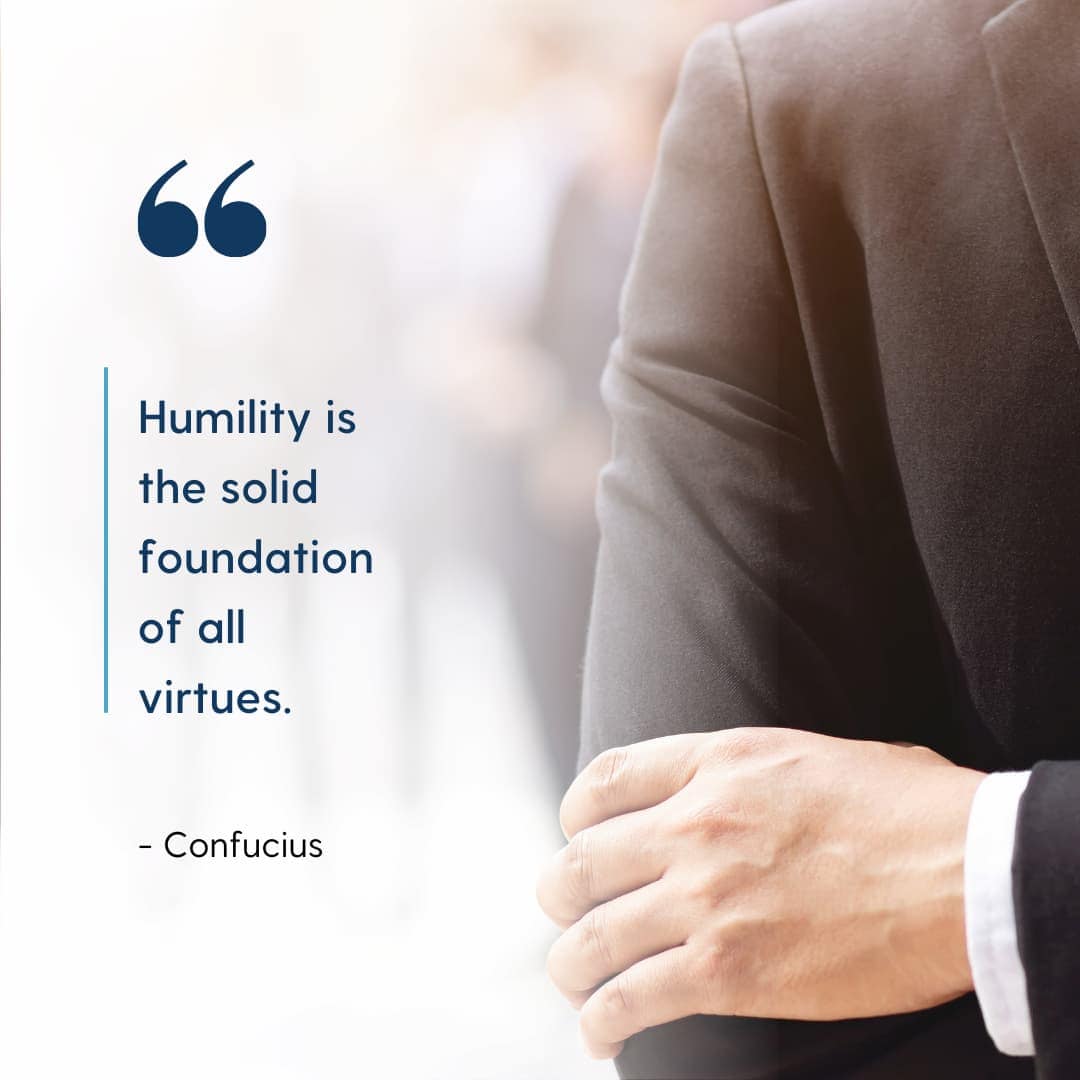 A man in a suit and the quote "Humility is the solid foundation of all virtues" by Confucius.