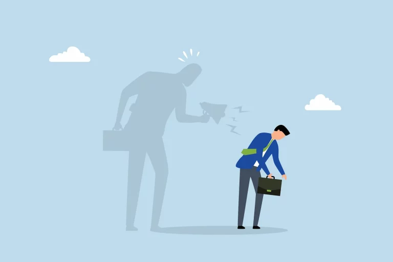 A sad man in a suit being yelled at by its shadow, symbolizing the voice of our inner critic.