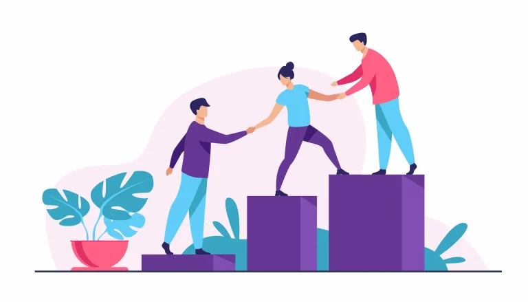 Coworkers helping each other improve, showcasing the importance of creating allies to grow in your career.