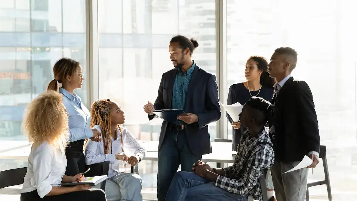Facilitator leading a custom corporate training session with a business team.